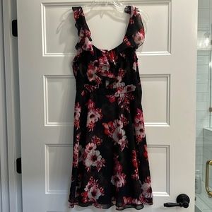 Great condition black dress with flowers made by White House Black market size 8